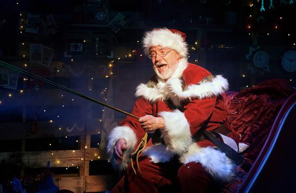 Father Christmas sat in his sleigh