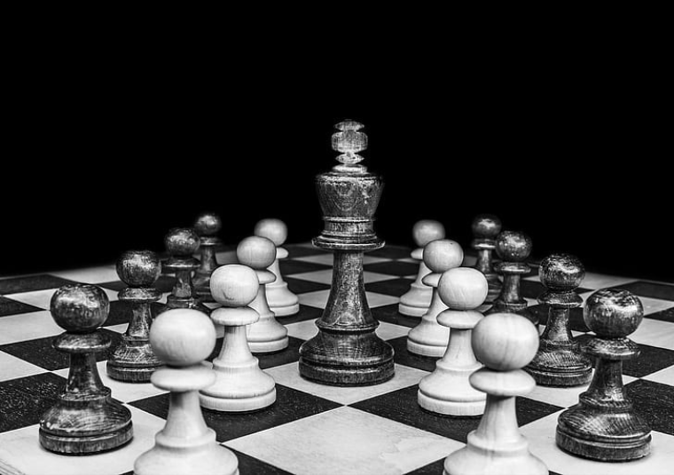 A black and white image of a chess board.