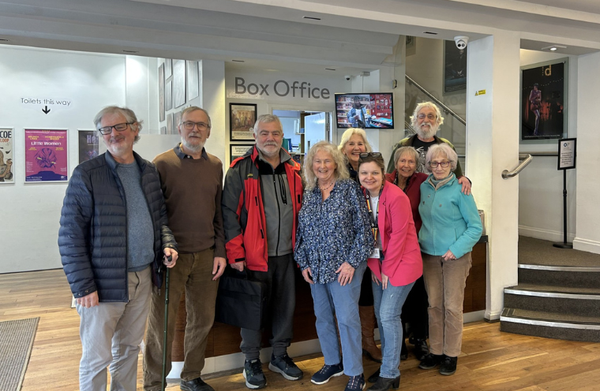 Group of Playmaker Later participants from 2025 standing in the lobby of Oxford Playhouse