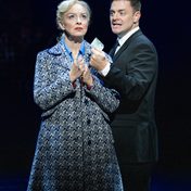 Vivienne Carlyle as Mrs Johnstone and Kristofer Harding as the Narrator