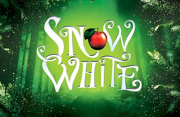 A magical forest of snow covered branches with glittering gold magic sparkles all around a whimsical 'Snow White' title with a bright red apple.