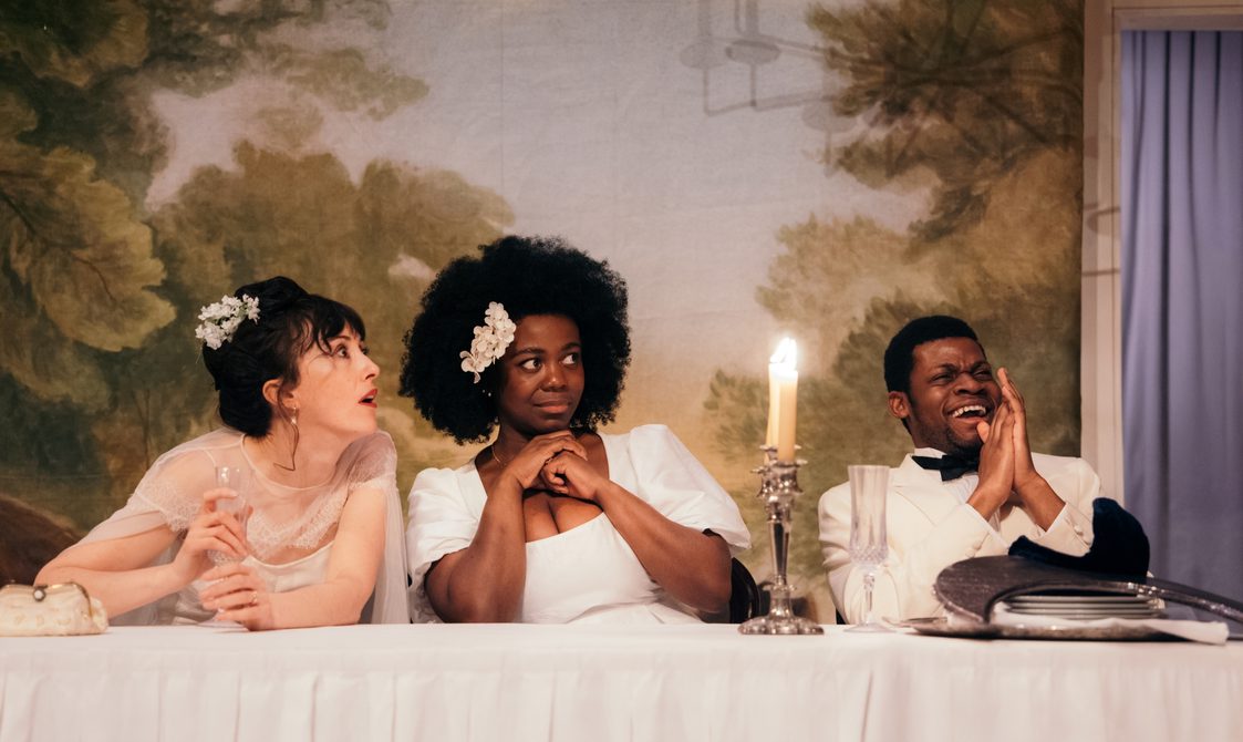 Hedydd Dylan as Hippolyta, Tiwa Lade as Hermia and David Olaniregun as Lysander in A Midsummer Night's Dream