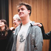 Company cast in rehearsals