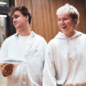 Company cast in rehearsals