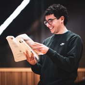 Company cast in rehearsals