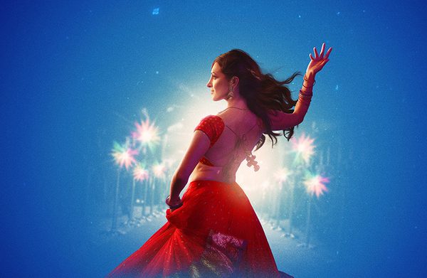 Illustration of a Bollywood dancer in a bright red outfit with photographers flashing their cameras in the background.