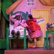 Harris Beattie and Julie Nunes as the grandmother and Little Red Riding Hood in the cottage.