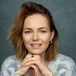 Kara Tointon profile image against a dark blue-grey background.