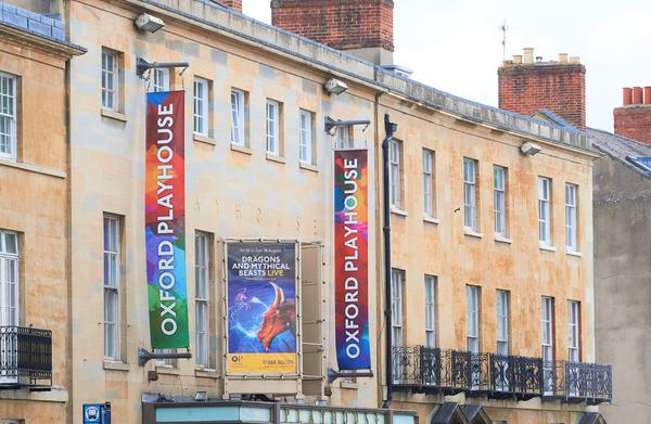 Above the entrance of the Oxford Playhouse, showing the top of the building on Beaumont Street