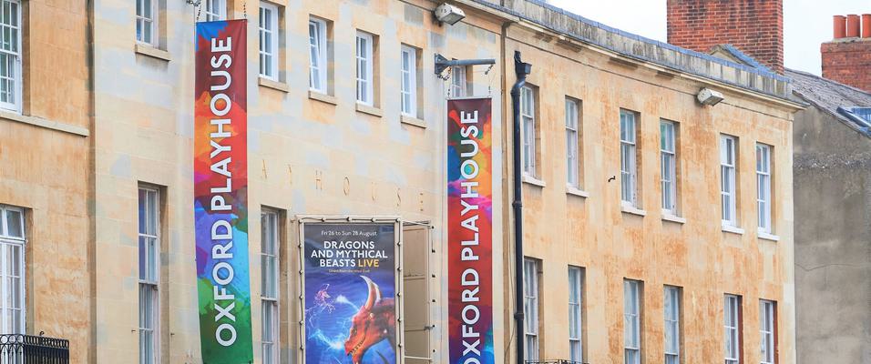 Above the entrance of the Oxford Playhouse, showing the top of the building on Beaumont Street