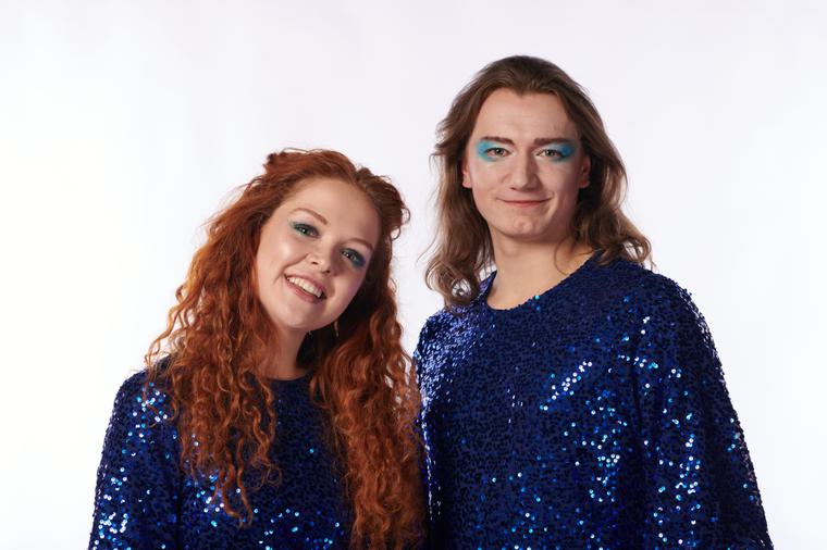 Mared Lewis and Harry Jack in blue sequin jumpsuits