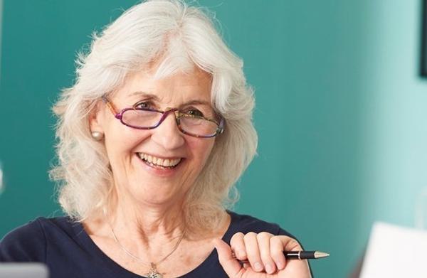 A member of the Adult Company smiling