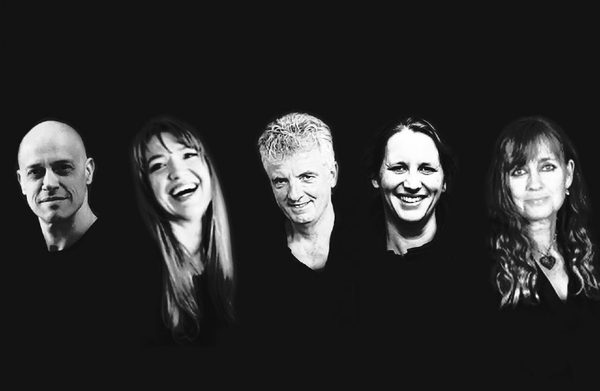 The performers looking at the camera