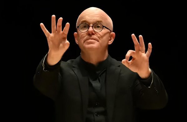 The performer conducting