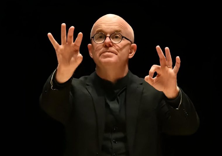 The performer conducting