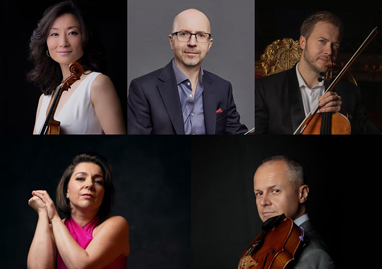 The performers facing the camera, some of them holding instruments