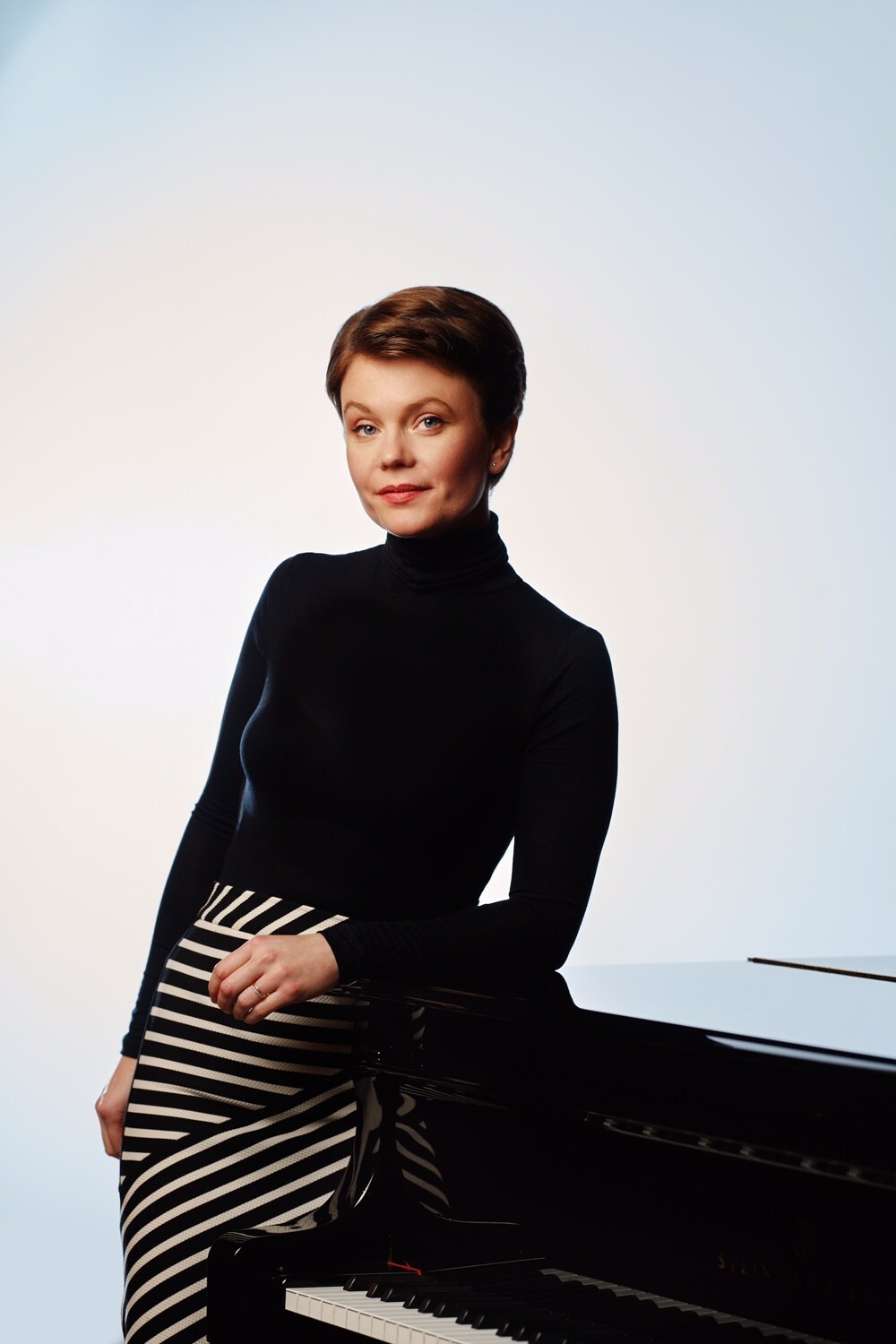 Performer and grand piano