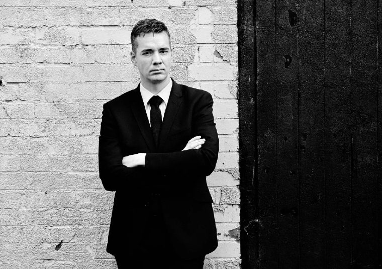 The performer looking at the camera