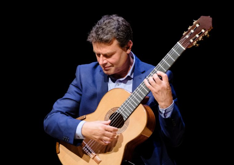 The performer holding an instrument