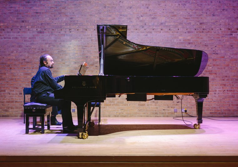 Performer playing piano