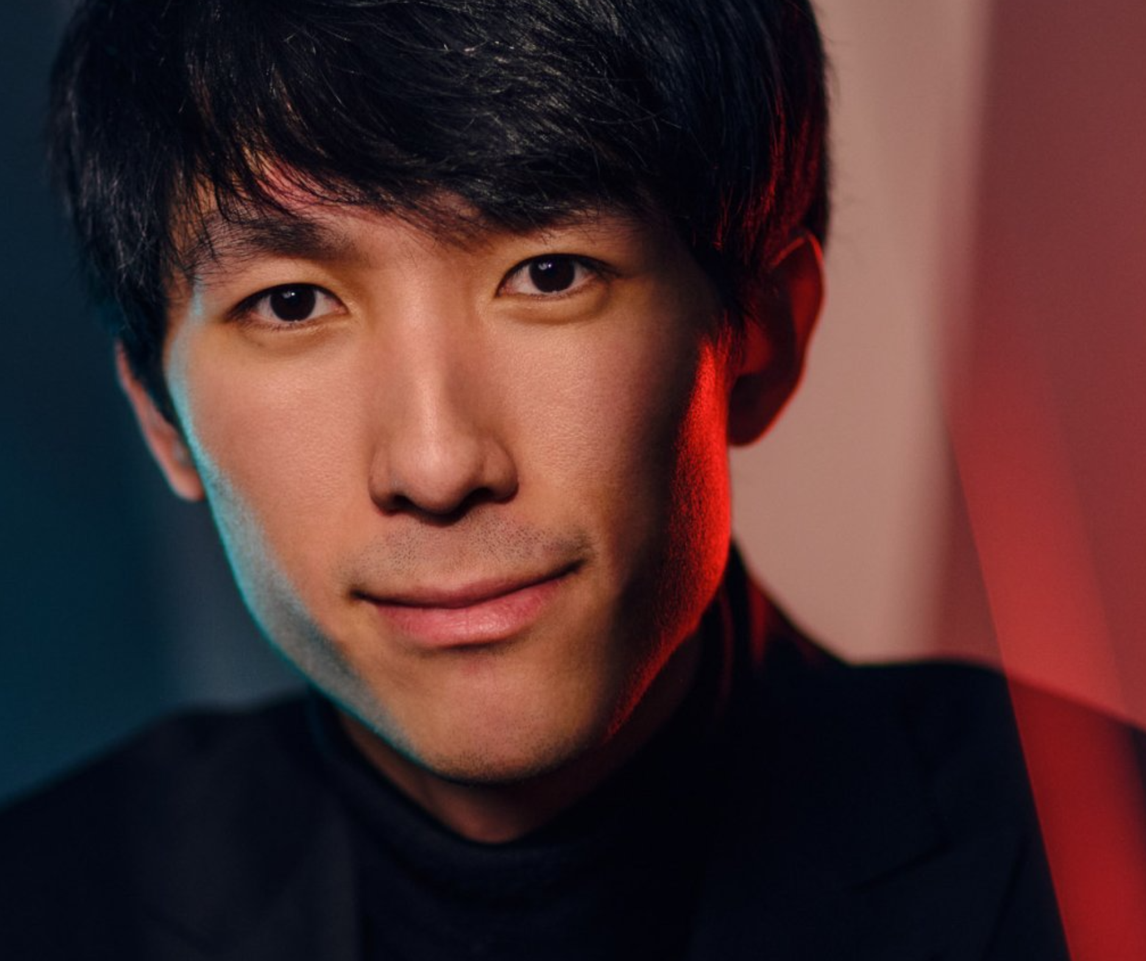 The performer looking at the camera