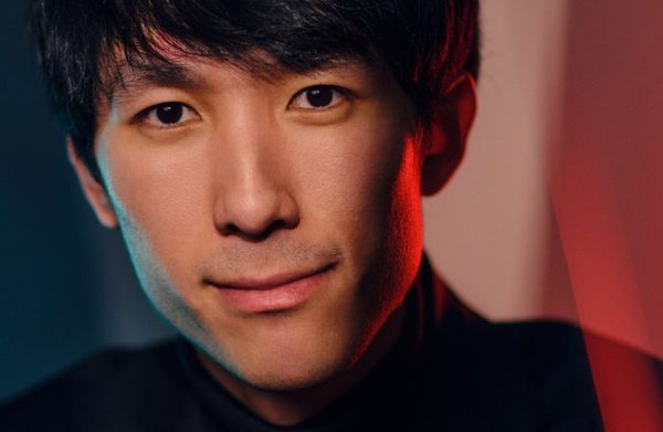 The performer looking at the camera