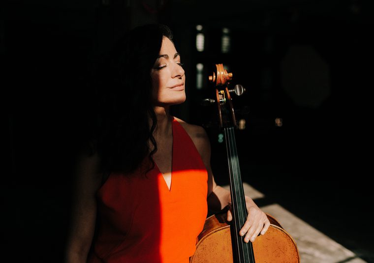 Performer holding instrument