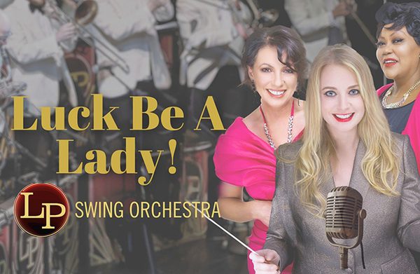 The performers standing behind a microphone with the title to the left of the image